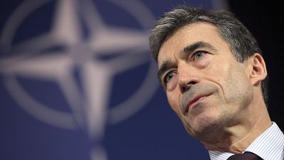 NATO Secretary General Anders Fogh Rasmussen addresses the media at NATO headquarters in Brussels, Friday Dec. 4, 2009.