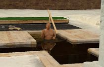 Vladimir Putin plunged into ice-cold water.