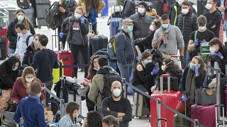 Travellers at JFK Airport, New York