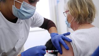 Michelle Wecxsteen, 83, receives the Pfizer-BioNTech vaccination against COVID-19 at Dron hospital in Tourcoing, northern France, Tuesday, Jan. 19, 2021.