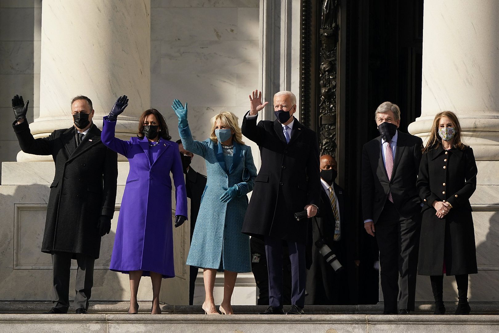 President-elect Joe Biden, his wife Jill Biden and Vice President-elect Kamala Harris and her husband Doug Emhoff arrive at the steps of the U.S. Capitol.