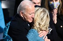 Joe Biden embraces his wife Jill after being sworn in as the 46th US President at the US Capitol in Washington, DC. January 20, 2021