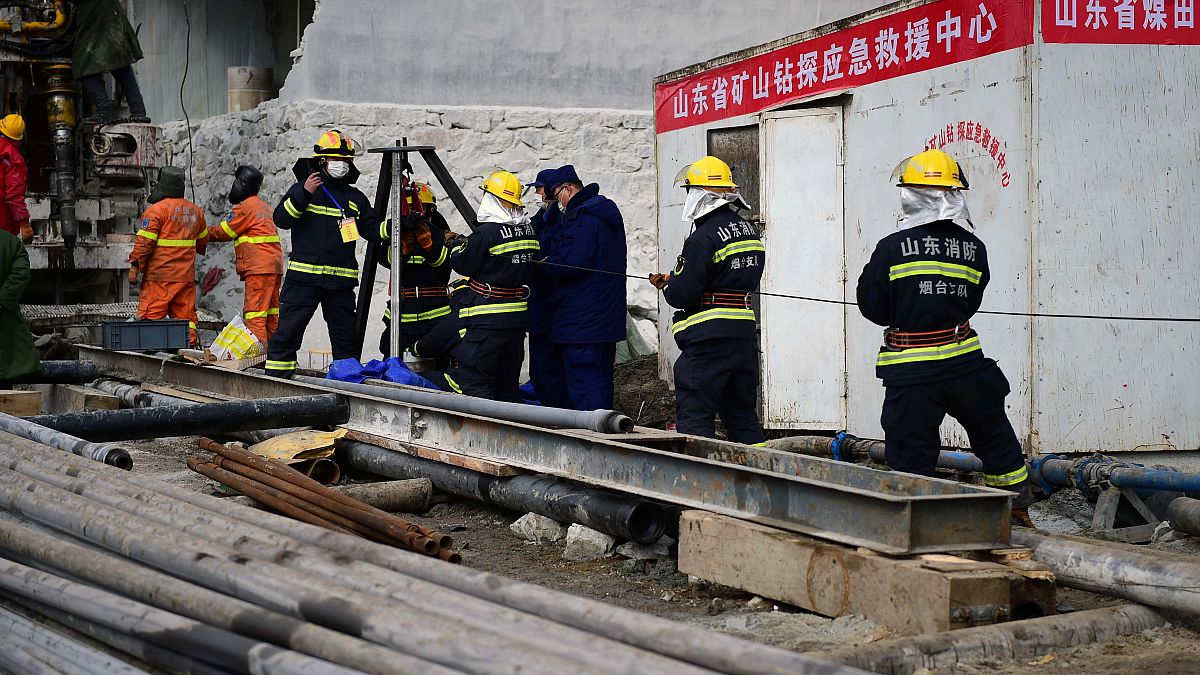 A rescue team working at the site of a gold mine explosion where more than 20 miners are trapped underground in Qixia, in eastern China's Shandong province, Jan. 20, 2021.