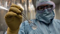 A technician shows a vial of the Cuban made COVID-19 vaccine called Soberana 2