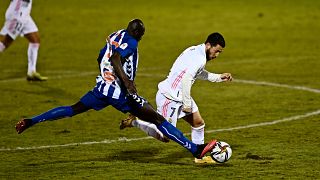 Alcoyano's Ali Diakite challenges Real Madrid's Eden Hazard during the upset