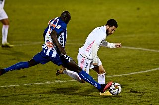 Alcoyano's Ali Diakite challenges Real Madrid's Eden Hazard during the upset