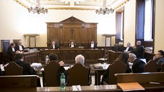This picture shows the trial of the former president of the IOR Vatican bank, Angelo Caloia (not seen) on embezzlement charges, on May 9, 2018 at the Vatican.