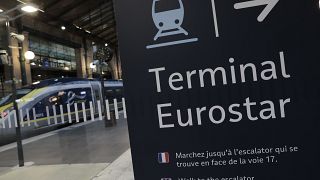 In this Dec.21, 2020 file photo, an information board is displayed at Gare du Nord train station in Paris.