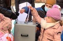 little girl voting