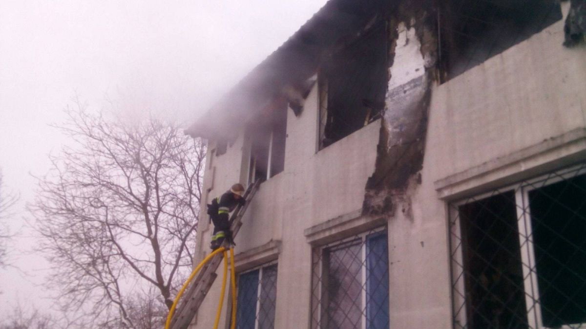 Pictures showed firefighters tackling smoke from burned-out rooms