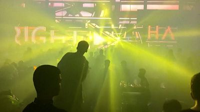 People dancing inside a nightclub