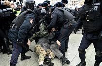 Riot police detain protesters during a rally in support of jailed opposition leader Alexei Navalny in downtown Moscow on January 23, 2021.