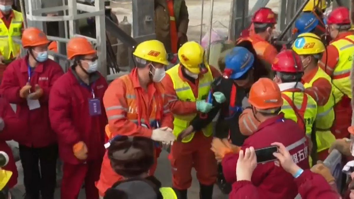 Workers are rescued from a Chinese gold mine.