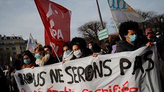 Students demonstrate with a banner reading "We will not be the the sacrificed generation", Jan. 20, 2021 in Paris.