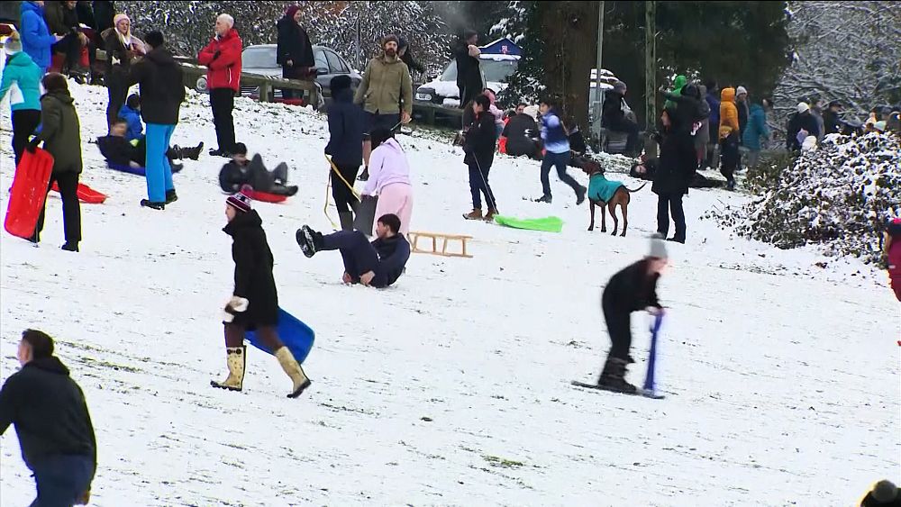 britons-break-out-sledges-to-enjoy-snow-during-national-lockdown