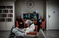 Elderly residents gather in a common area at The Vilanova Care Home in Corbas, France.