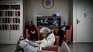 Elderly residents gather in a common area at The Vilanova Care Home in Corbas, France.