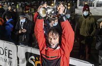 France's Yannick Bestaven lifts the trophy after winning the Vendee Globe solo around-the-world sailing race, in Les Sables-d'Olonne, France, early Thursday, Jan.28, 2021.