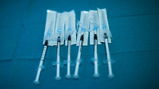 Syringes with Pfizer/Biontech COVID-19 vaccines are ready to be used at the MontLegia CHC hospital in Liege, Belgium