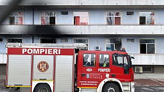 A fire engine is parked a hospital after a fire broke out on the ground floor Friday Jan. 29, 2021.