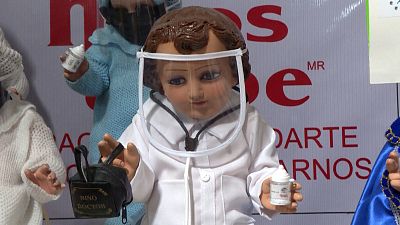 Jesus-Puppen mit Mundschutz