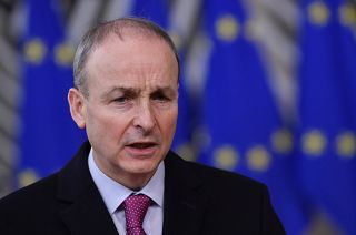 FILE - In this file photo dated Thursday, Dec. 10, 2020, Ireland's Prime Minister Micheal Martin speaks as he arrives at the European Council building in Brussels.