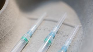 Syringes with Pfizer-BioNTech COVID-19 vaccines are ready to be used at the Nurse Isabel Zendal Hospital in Madrid, Spain, Monday, Feb. 1, 2021.