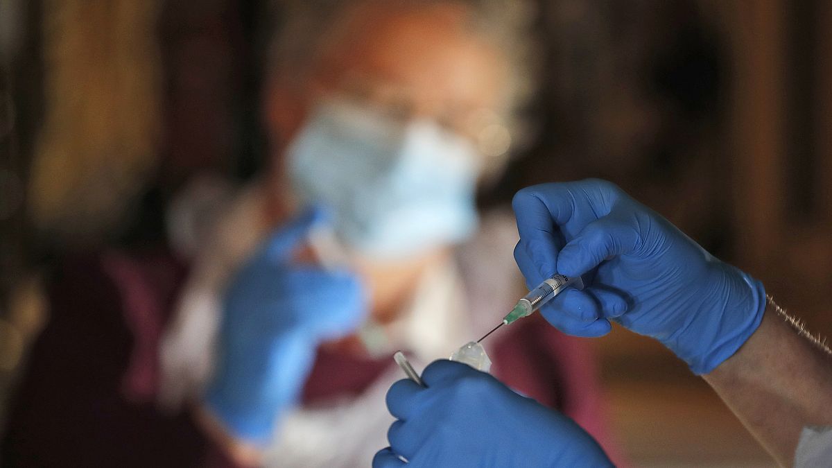 Health workers prepare for COVID-19 vaccination  inside Salisbury Cathedral in Salisbury, England, Jan. 20, 2021. 