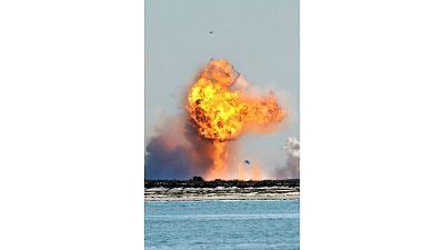 SpaceX's bullet-shaped Starship prototype explodes after crashing while attempting to land following a successful test launch, Tuesday, Feb. 2, 2021, in Boca Chica, Texas.