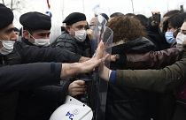 Turkish police officers clash with students of the Bogazici University protesting the appointment of a government loyalist to head their university, in Istanbul.