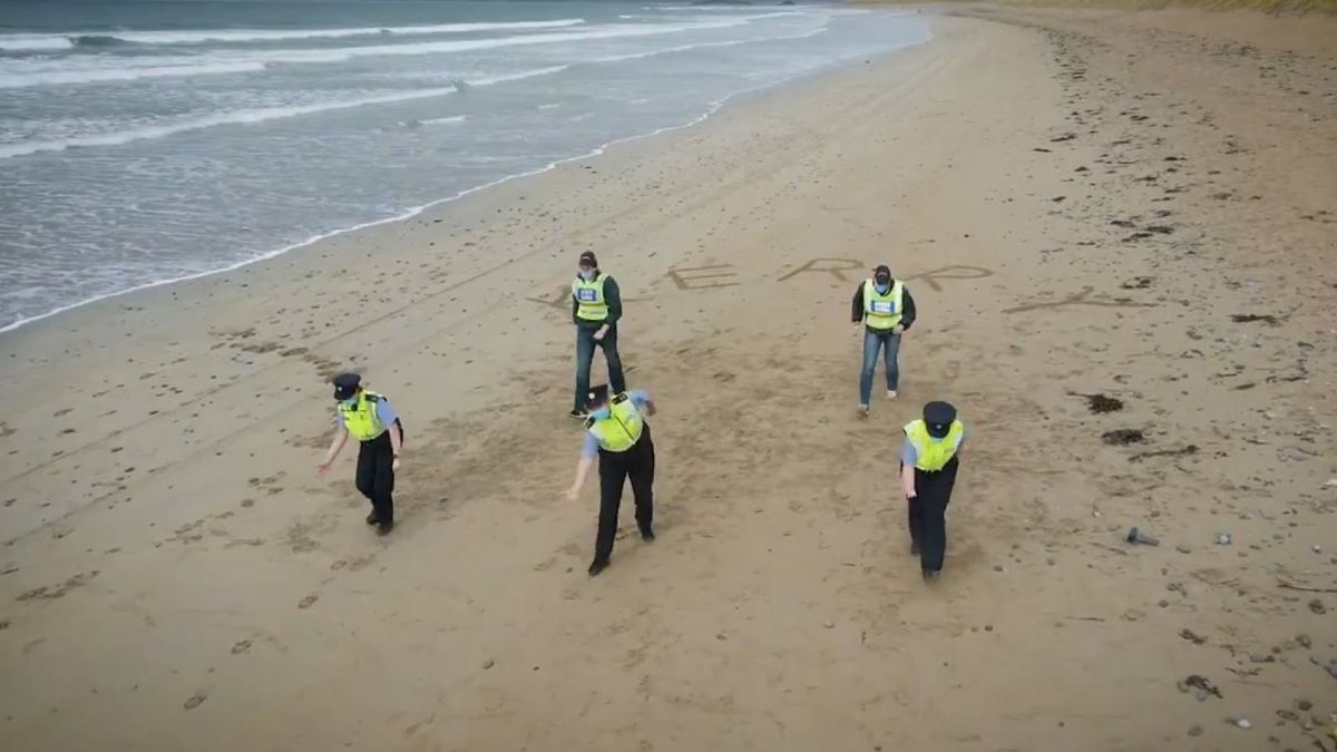 Garda Police dancing on a beach in Ireland as part of the #JerusalemaChallenge