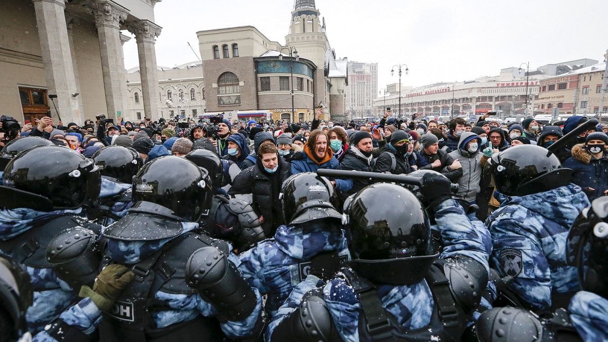 People clash with police during a protest against the jailing of opposition leader Alexei Navalny in Moscow, Russia.