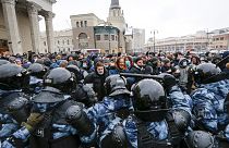 People clash with police during a protest against the jailing of opposition leader Alexei Navalny in Moscow, Russia.