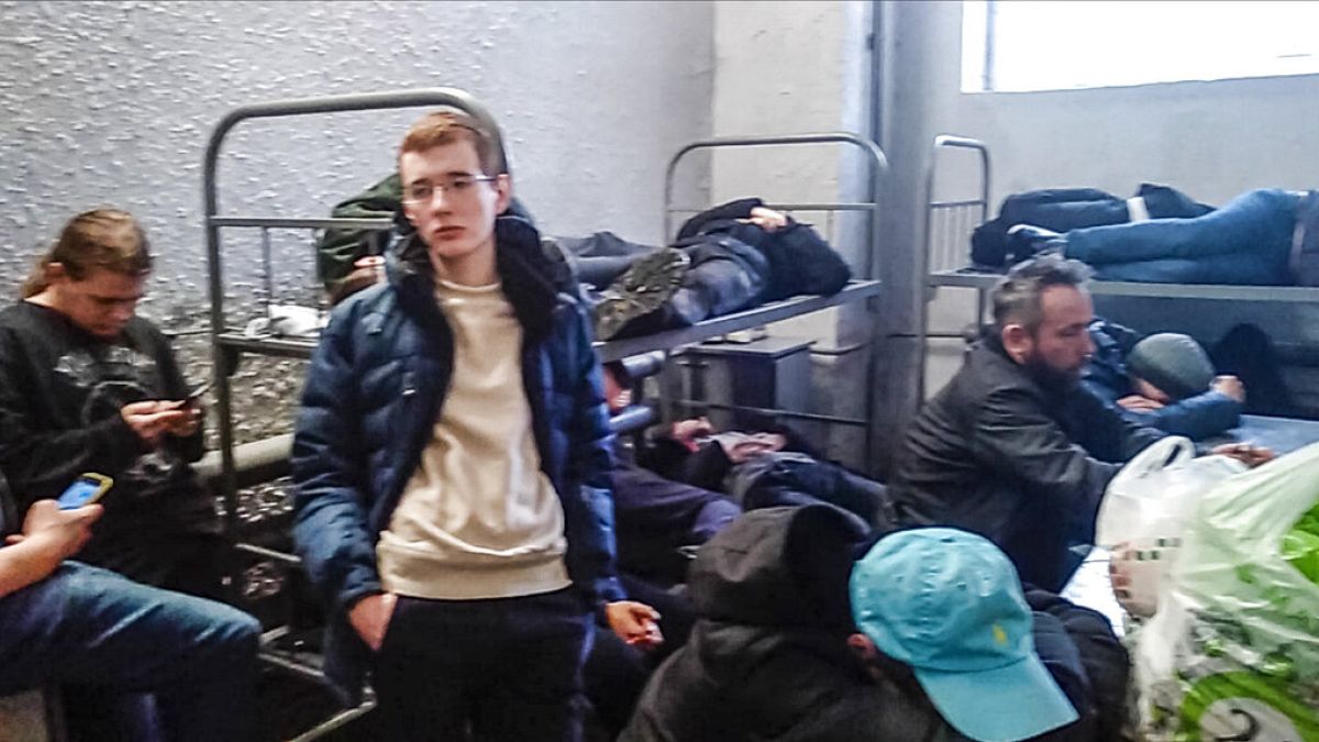 Detained people inside the deportation centre Sakharovo, in Moscow, Russia, Thursday, Feb. 4, 2021. 