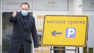 Health Secretary Matt Hancock during a visit to the NHS vaccine centre in the grounds of the horse racing course at Epsom in Surrey, England, Monday Jan. 11, 2021.