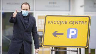 Health Secretary Matt Hancock during a visit to the NHS vaccine centre in the grounds of the horse racing course at Epsom in Surrey, England, Monday Jan. 11, 2021. 