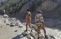 This photograph provided by Indo Tibetan Border Police (ITBP) shows ITBP personnel after a portion of Nanda Devi glacier broke off, Uttarakhand, India, February 7, 2021.