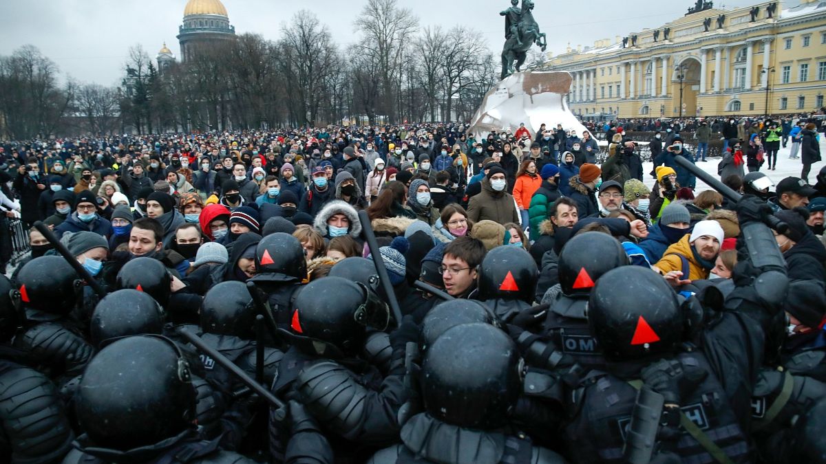Protesters in St. Petersburg, Russia, clash with police over the jailing of opposition leader Alexei Navalny on Jan. 23, 2021.