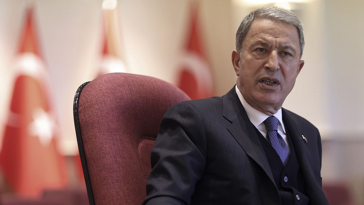 Turkish Defense Minister Hulusi Akar speaks during a news conference in Ankara.