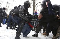Police detain protesters during a protest against the jailing of opposition leader Alexei Navalny in St. Petersburg, Russia