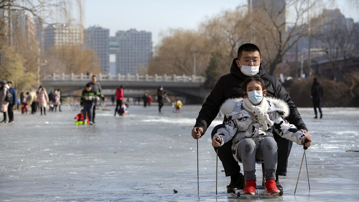 Mann und Kind in Peking.