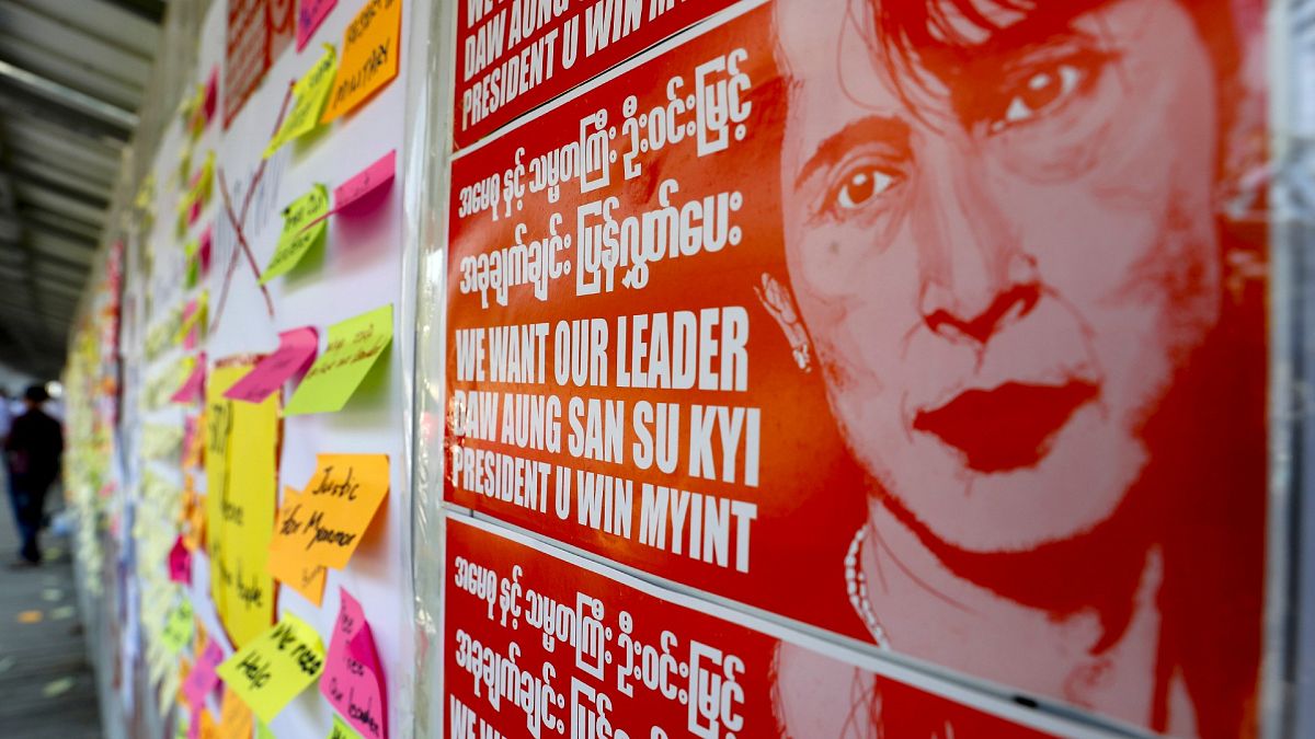 A public notice-board is filled with pictures of national leader Aung San Suu Kyi and notes from demonstrators against the military coup in Mandalay, Myanmar on Thursday, Feb.