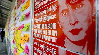 A public notice-board is filled with pictures of national leader Aung San Suu Kyi and notes from demonstrators against the military coup in Mandalay, Myanmar on Thursday, Feb.