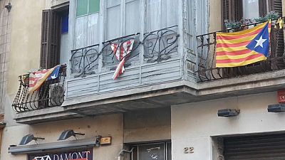 Catalan flags fly on buildings in Barcelona ahead of regional elections