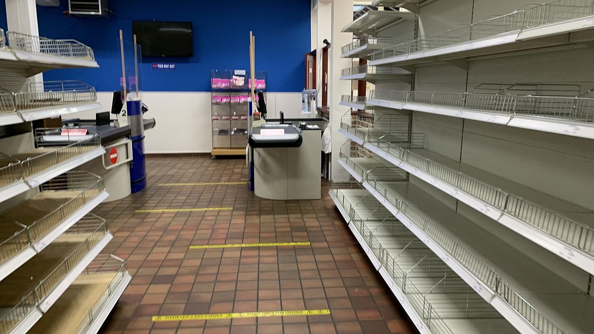 Empty shelves at Stonemanor, a British supermarket in Belgium