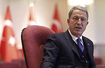 Hulusi Akar said 12 of the victims had been shot in the head. One had died a bullet wound in the shoulder