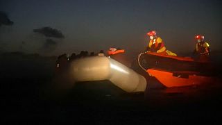 Open Arms rescue workers approach stranded migrants