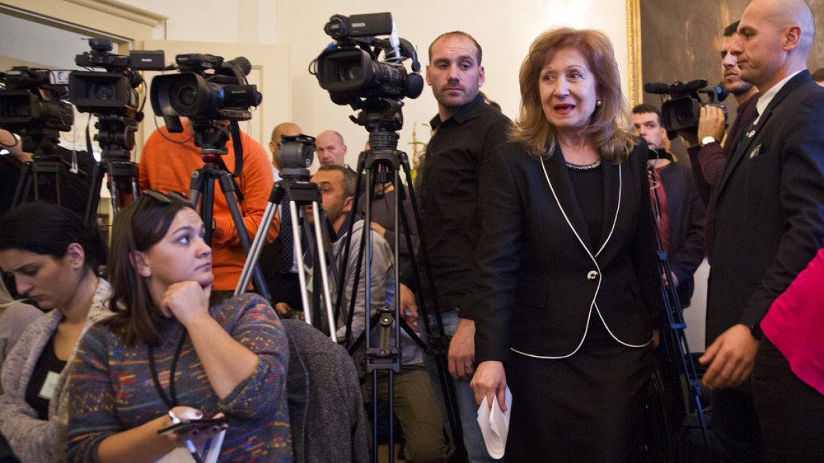 President of the Kosovo Specialist Chambers Ekaterina Trendafilova 2nd from right, arrives at a media conference on Monday, Nov. 23, 2017