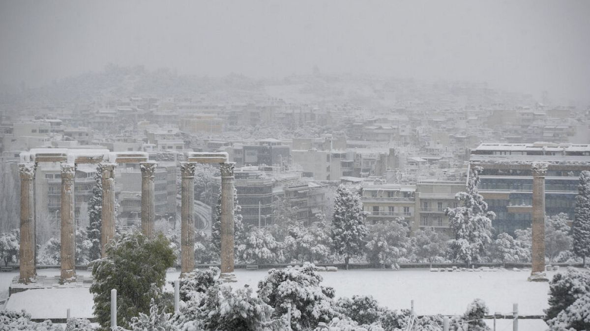 Snow covers the ancient temple of Zeus in Athens