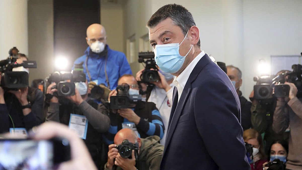 Georgia's Prime Minister Giorgi Gakharia speaks to the media after voting at a polling station during the parliamentary elections in Tbilisi, Georgia, Saturday, Oct. 31, 2020.